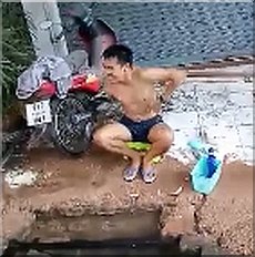 Taking a bath at a broken pipe